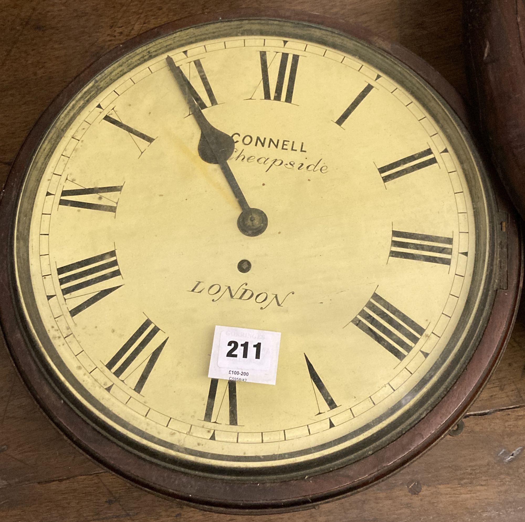 A Victorian mahogany dial wall timepiece, the dial inscribed Connell, 23 Cheapside, London, with single fusee movement, the dial not fi